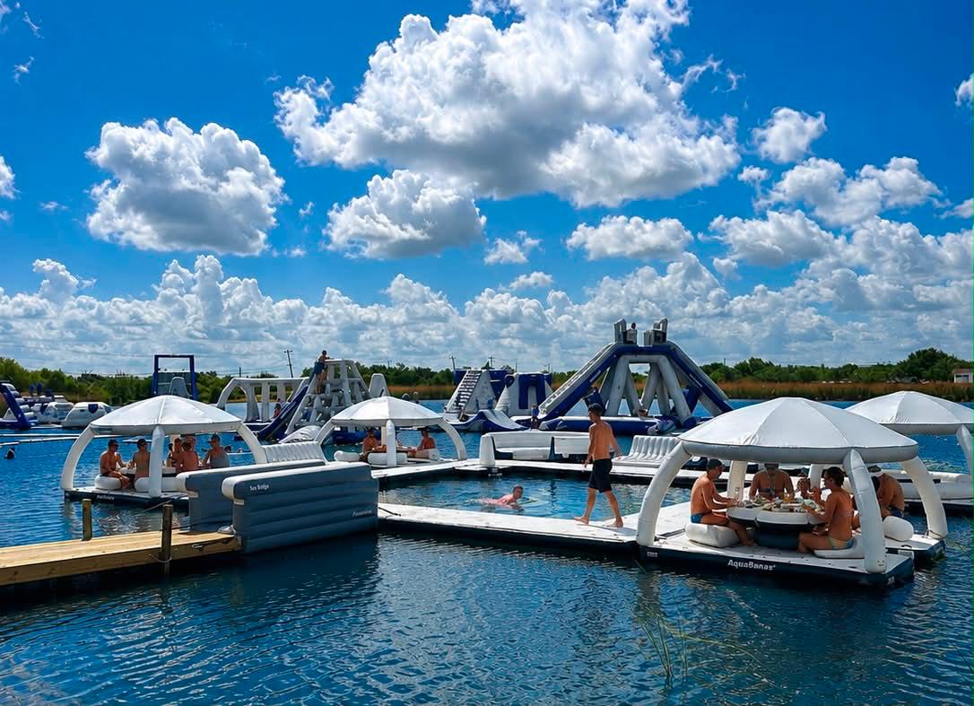 Shaded floating Aqua Cabanas beside the Stoke Factory aqua obstacle course